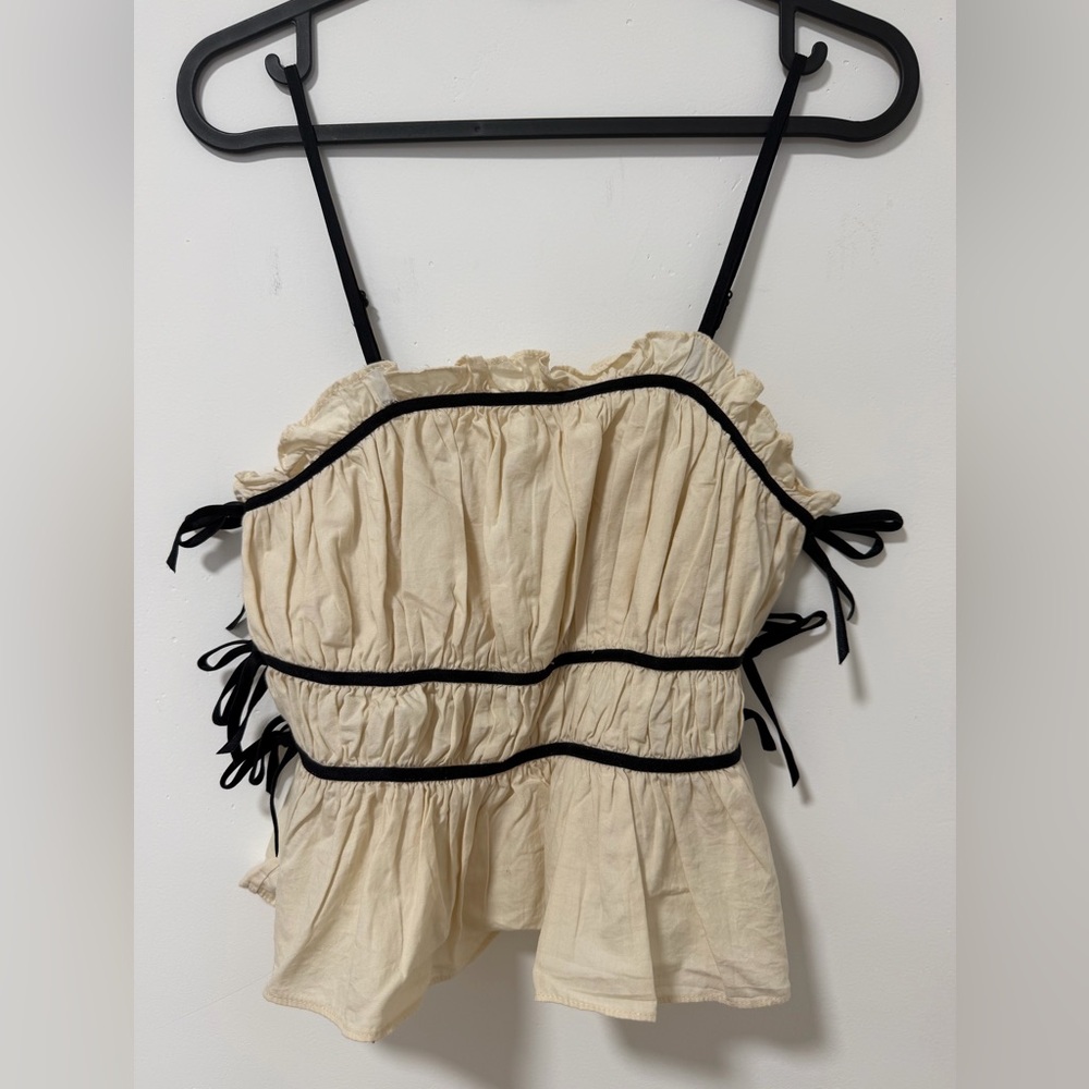 Cream Top with black velvet trim and side bows